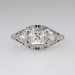 Elegant .22ct t.w. Art Deco Three Stone Old European Cut Diamond Filigree Engagement Ring Platinum