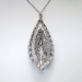Edwardian 1920's 1.66ct t.w. Old European Cut Diamond Filigree Platinum Pendant