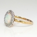 Art Nouveau 1900's 1ct t.w. Opal & Diamond Halo Ring 18k