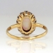 Art Nouveau 1900's 1ct t.w. Opal & Diamond Halo Ring 18k