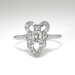 Edwardian 1920's Vintage .49ct t.w. Emerald Cut Diamond Engagement Anniversary Bow Ring Platinum