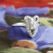 Edwardian 1920's Vintage .49ct t.w. Emerald Cut Diamond Engagement Anniversary Bow Ring Platinum