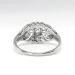 Edwardian Diamond Engagement Ring .63ct t.w. Circa 1920's Old European Cut Floral Filigree Platinum Engagement Ring
