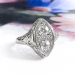 Art Deco .57ct.tw. Diamond Toi et Moi Floral Filigree Navette Ring 18K