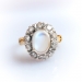 Vintage Moonstone Cabochon and Diamond Halo Ring Mid-Century 18k Yellow Gold and Platinum