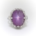 Art Deco 14.11ct.tw. Purple Star Sapphire And Mixed Cut Diamond Platinum Cocktail Ring